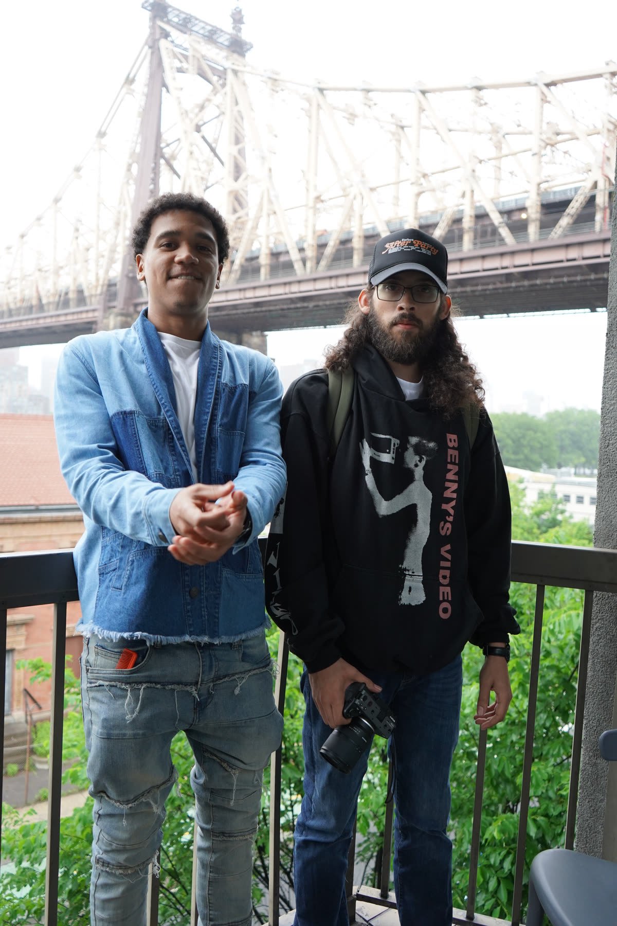 On the balcony before the shoot, Queensboro Bridge behind